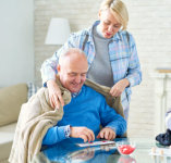 caregiver and elderly man